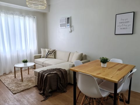 Fully air- conditioned living room and dining area.