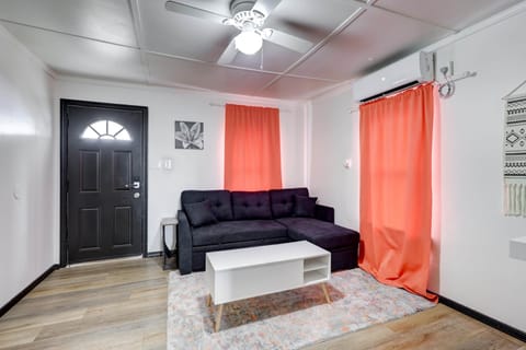 Living Room with pull out sleeper sofa. The coffee table converts for work or eating space.