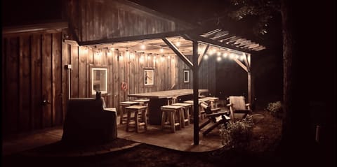 Outdoor handmade patio table seats 12! Charcoal grill right on patio