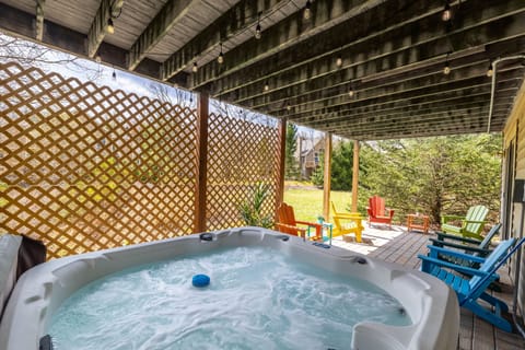 Soak, sip, and unwind in the 6-seater bubbling hot tub—your private hideaway for ultimate mountain relaxation.