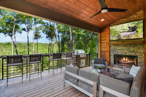 Relax and entertain on the covered deck off the living room.