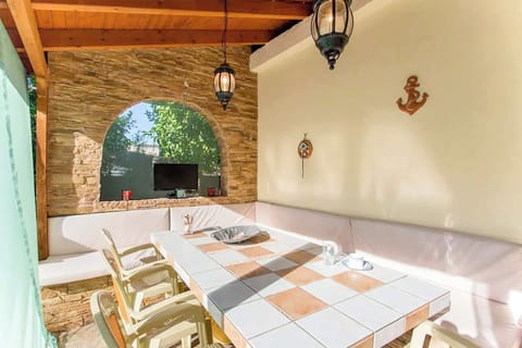 Soak in the sun by your private hot tub


