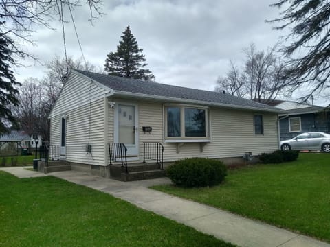 Outside view of ranch style home.  All 3 bedrooms on the main level and bathroom. 2nd bathroom downstairs.