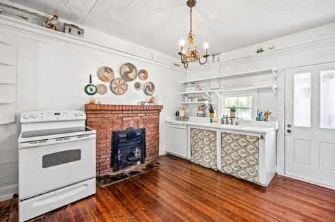 Fully stocked kitchen with all the utensils needed to prepare a good warm meal.