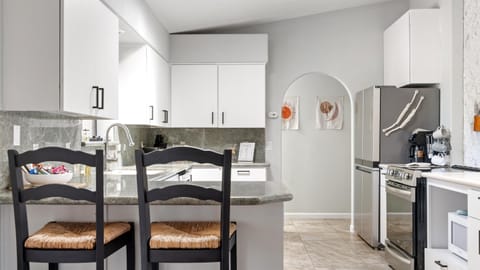 Large kitchen with barstool seating