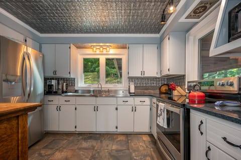 Kitchen is adjacent to the Dining Area