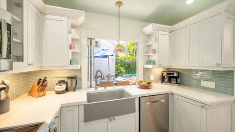 A convenient passthrough window from the kitchen to the pool area...