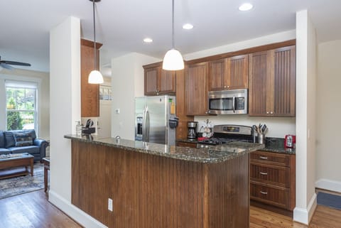 Kitchen with dishwasher and two coffeemakers (Standard Drip & Keurig).