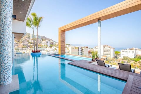 The Shared Rooftop Pool Space