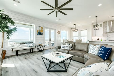Wall of windows showcase the great beach views
