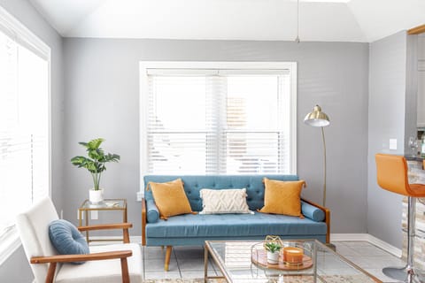 Full size couch & accent chair allows for guests to lounge comfortably together