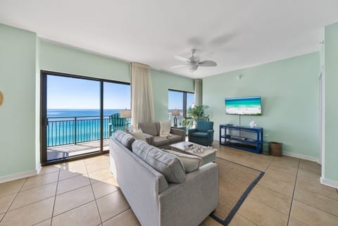 Relax in your oceanfront living room with stunning turquoise waters just steps from your balcony door.