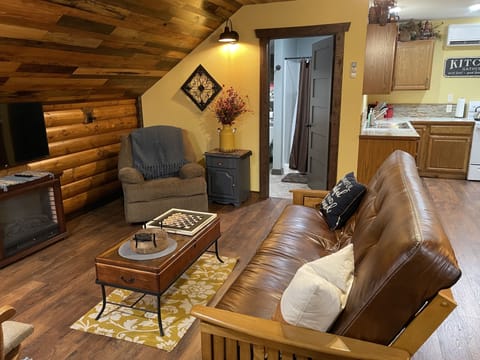 Futon can be used as a FULL SIZE bed if needed.  Bedding is stored in drawers.