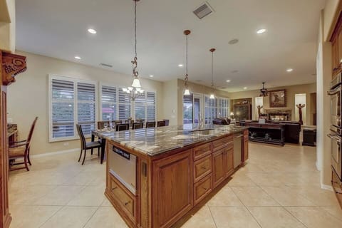 fancy kitchen with Stainless applianes and 6 burner gas dacor stove for iron chef competitions!