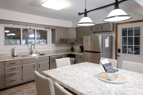 Fully stocked kitchen with Kuerig dual coffee pot.