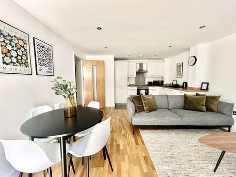 Spacious living/dining area with smart TV (1)