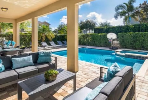 Enjoy your morning coffee by the amazing pool in a relaxing outdoor area with plenty of lounge chairs and sunshine. "Loved relaxing by the pool after a long day at the parks."
