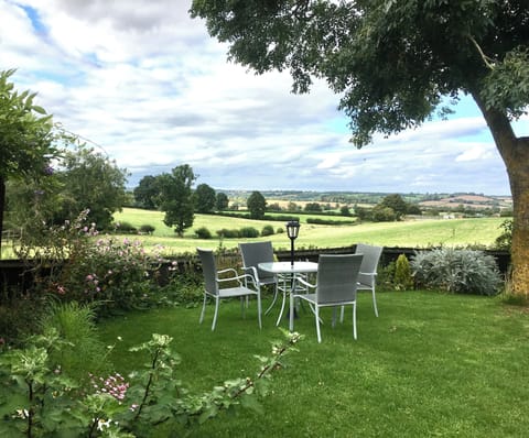 Relax and unwind by enjoying the scenery from the private back garden. 