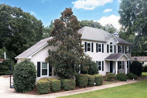 This is a gorgeous home in a peaceful family neighborhood.  The kayak racks are just out back.  Grab one and head out to the lake.