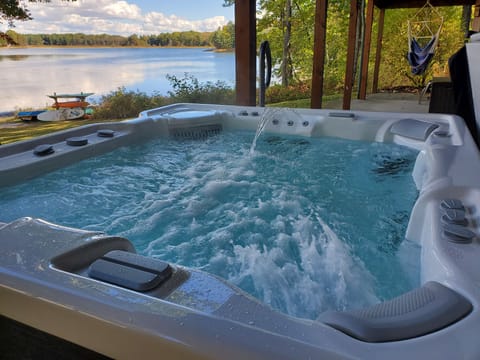 Grandee 7-person hot tub with lakefront views and peaceful scenery