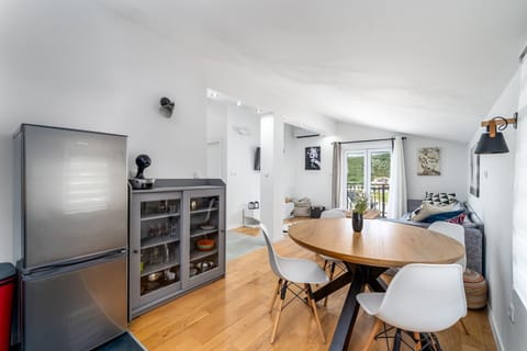  There is also a Dolce Gusto coffee maker and a dining table for 4