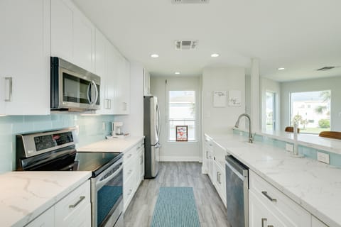 Fully equipped kitchen with stainless steel appliances