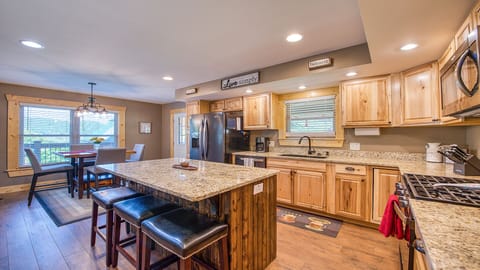 Enjoy dinner at the dining room table and/or bar with a view!