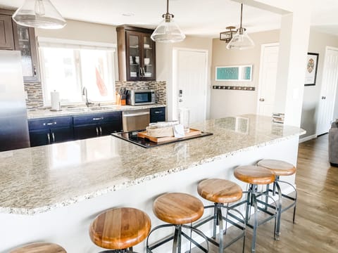 Kitchen with plenty of bar stool seating