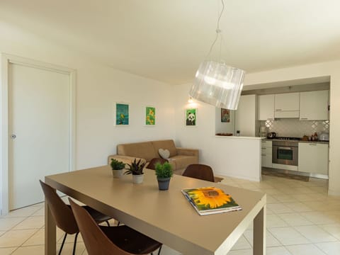 Sky, Mountain, Daytime, Building, Plant, Natural Landscape, House, Vegetation, Highland, Tree