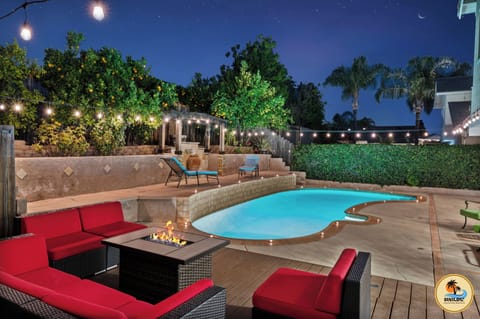 Chilling by the firepit with poolside views.
