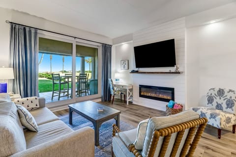 Living Area Featuring Spectacular Views of Amelia Island's Sandy White Beach -  72 Inch Flat Screen TV and Electric Fireplace