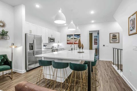 Cook and gather together in the open chef’s kitchen.