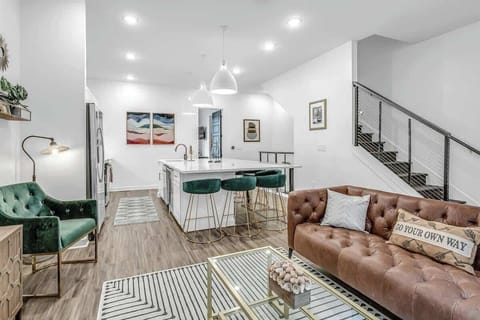 Seamless open space blending the living area and kitchen.