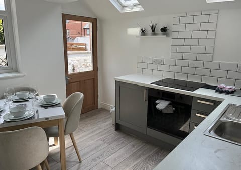 Kitchen with M&S Plates ,cups etc 