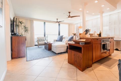 Living Area: Open concept with lanai access & fresh updated furnishings