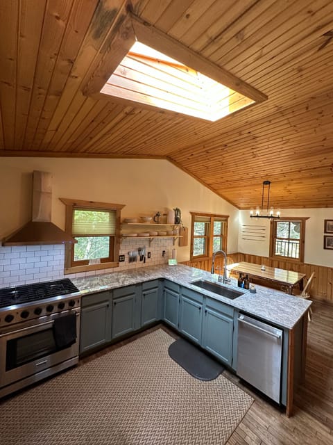 Open concept kitchen. View from entry.