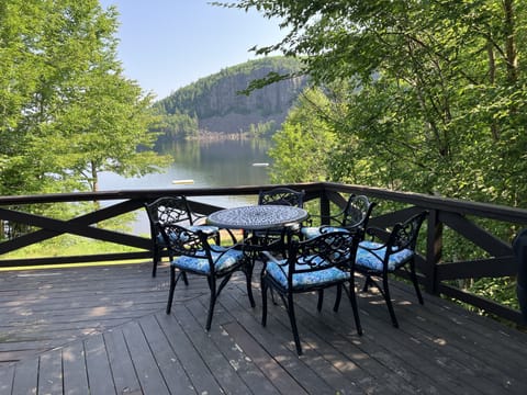 A perfect spot for a morning coffee, secluded by a curtain of trees.