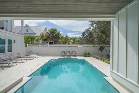 Large private pool with outdoor entertainment area
