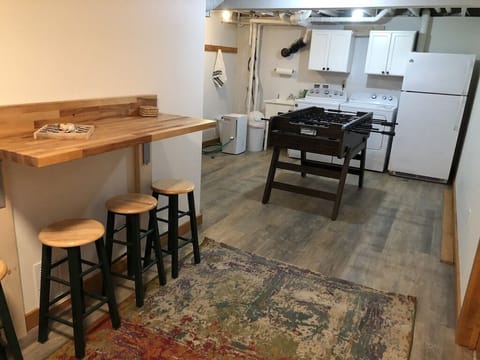 Game Room: (Foosball, Darts) also board games/puzzles/books for the whole fam