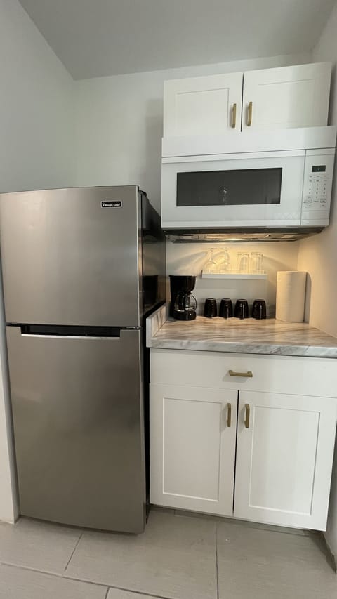 Full size refrigerator, microwave, coffee maker, hot plate for basic booking.