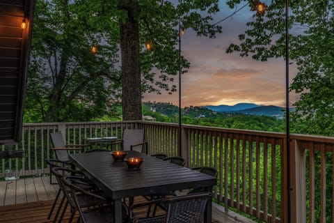 Breath-taking mountain view on our string-lit deck