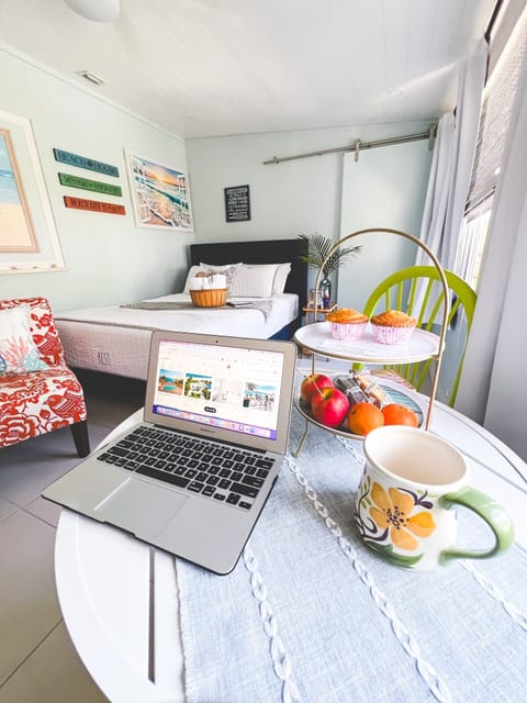 A dedicated work space with high-speed internet overlooking the tropical garden.