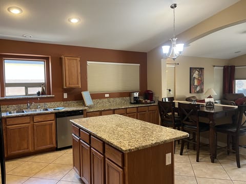Large kitchen island where friends & family will naturally gather
