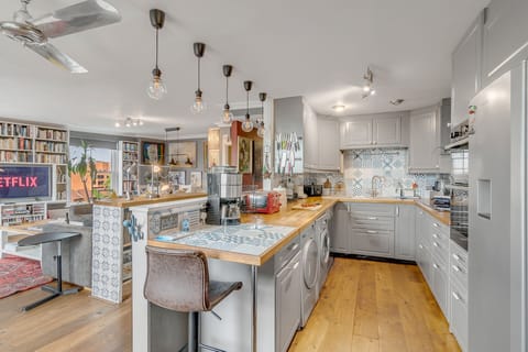 There is also a fully equipped kitchen with all appliances like a full-size freezer and fridge, electric stove, oven, microwave, sink, coffeemaker, dishwasher as well as a washer and separate dryer. 

Here you will also find all the necessary pots, pans, dishware and cooking ware and all utensils and cooking tools for all your needs.

If you enjoy cooking this kitchen will surp...