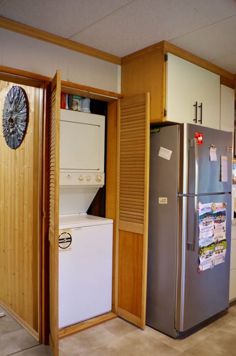 Kitchen - washer and dryer, full size fridge with freezer.