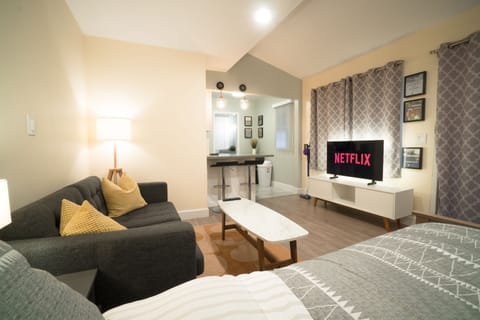 Your own private suite with kitchenette, bathroom, queen bed, and smart TV.