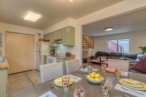 Gather, dine, and make memories in this beautifully set dining space.