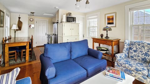 Bright and cozy main living area with living room, dining area and kitchen