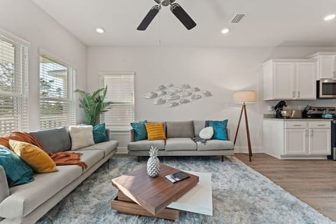 Enjoy relaxing around the open living space recapping the memories made during your stay.  The natural sunlight provides an environment to relax and enjoy your vacation.