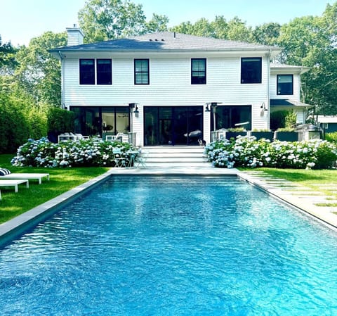 Private backyard with heated saltwater swimming pool and outdoor heated shower. 